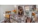 Dining area with wood floors offering an open view of the kitchen and island seating at , Loganville, GA 30052