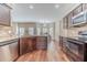 Modern kitchen featuring stainless steel appliances and an adjacent dining area at , Loganville, GA 30052