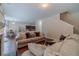 Spacious living room with hardwood floors, comfortable seating, and a view of the kitchen at , Loganville, GA 30052