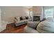 Inviting living room featuring a fireplace and comfortable seating arrangement on hardwood floors at , Loganville, GA 30052