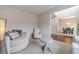 Cozy living room with neutral palette, comfortable seating, and open dining area at , Loganville, GA 30052