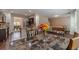 Open-concept living space with a dining area leading to the kitchen and living room at , Loganville, GA 30052