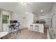 Open-concept living space with a kitchen and an office area, perfect for multi-functional living at 1429 Noel Ne Dr, Brookhaven, GA 30319