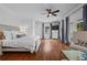 Spacious main bedroom featuring large windows, hardwood floors and sitting area at 1429 Noel Ne Dr, Brookhaven, GA 30319