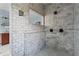 The main bathroom features a tiled, walk-in shower with dual shower heads at 1429 Noel Ne Dr, Brookhaven, GA 30319