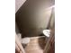 Cozy bathroom featuring a pedestal sink, wood look floors, and modern fixtures at 1794 Fielding Way, Hampton, GA 30228