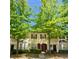 Charming townhome with well-maintained front yard and inviting entrance at 1794 Fielding Way, Hampton, GA 30228