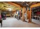 Unfinished basement showing ample storage, fitness equipment, and exposed insulation at 2059 Ivey Chase Dr, Dacula, GA 30019