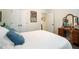 Bright bedroom featuring a wood-frame bed, and a neutral palette at 2059 Ivey Chase Dr, Dacula, GA 30019