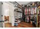 Spacious walk-in closet with custom shelving and storage solutions for organization at 2059 Ivey Chase Dr, Dacula, GA 30019