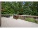 Spacious backyard deck complete with outdoor furniture and grill at 2059 Ivey Chase Dr, Dacula, GA 30019