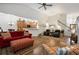 Spacious living room showcases hardwood floors, vaulted ceilings, and an open floor plan at 2059 Ivey Chase Dr, Dacula, GA 30019