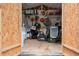 Organized storage room with lawn care equipment, shelving, and ample space at 2059 Ivey Chase Dr, Dacula, GA 30019