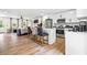 Stylish kitchen with stainless steel appliances, a sleek island, and seamless connection to the living area at 4430 Lamar Dr, Douglasville, GA 30134
