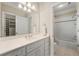 Well-lit bathroom with white vanity, drawers, a mirror, and a shower/tub combination at 4720 Cliffside Ct, Marietta, GA 30067