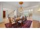 Traditional dining room with chandelier and view of the staircase at 4720 Cliffside Ct, Marietta, GA 30067