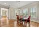 Charming dining room with hardwood floors, plantation shutters, and elegant lighting fixture at 4720 Cliffside Ct, Marietta, GA 30067