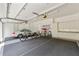 Spacious garage with a car, bikes, storage cabinets, and overhead lighting at 4720 Cliffside Ct, Marietta, GA 30067