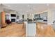 Spacious kitchen with center island, granite countertops, stainless appliances and open floor plan at 4720 Cliffside Ct, Marietta, GA 30067