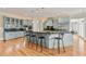 Expansive kitchen featuring stylish cabinetry, a large island with seating, and modern stainless steel appliances at 4720 Cliffside Ct, Marietta, GA 30067