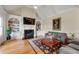 Bright and airy living room with fireplace and built-in bookshelves at 4720 Cliffside Ct, Marietta, GA 30067