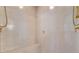 Shower area with a tiled bench, a handheld shower head, and gold fixtures at 4720 Cliffside Ct, Marietta, GA 30067