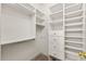 Organized walk-in closet featuring built-in shelving, drawers, and ample hanging space for clothes and accessories at 4720 Cliffside Ct, Marietta, GA 30067