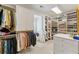 Custom walk-in closet features ample storage and organization options for clothing and accessories at 4720 Cliffside Ct, Marietta, GA 30067