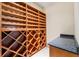 Custom wine cellar with wooden racks and counter space at 4720 Cliffside Ct, Marietta, GA 30067