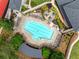 Community swimming pool with ample lounge chairs and tables for relaxing at 921 Laurel Crest Dr, Woodstock, GA 30189