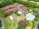 Aerial view of a community featuring tennis, basketball, playground, and swimming pool at 921 Laurel Crest Dr, Woodstock, GA 30189