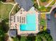 Aerial view of a sparkling community pool, featuring lane lines and diving board at 921 Laurel Crest Dr, Woodstock, GA 30189