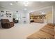 Large basement area perfect for entertainment, with guitars adorning the wall at 921 Laurel Crest Dr, Woodstock, GA 30189
