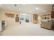 Spacious finished basement area with seating, desk, and entertainment space at 921 Laurel Crest Dr, Woodstock, GA 30189