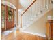 Welcoming foyer with hardwood flooring, a staircase, and a decorative front door at 921 Laurel Crest Dr, Woodstock, GA 30189