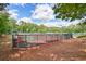 Community tennis courts are well-maintained and surrounded by fencing, offering a great space for sports at 921 Laurel Crest Dr, Woodstock, GA 30189