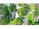 Aerial view of home featuring a well-maintained lawn, mature trees, and convenient street access at 1758 N Springs Dr, Atlanta, GA 30338