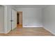 Cozy bedroom featuring hardwood floors and neutral walls at 1758 N Springs Dr, Atlanta, GA 30338
