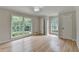 Bright bedroom with hardwood floors, large windows, and ample natural light at 1758 N Springs Dr, Atlanta, GA 30338