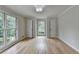 Spacious bedroom featuring hardwood floors, neutral paint, and large windows offering natural light at 1758 N Springs Dr, Atlanta, GA 30338