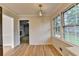 Dining area with hardwood floors, large windows, and modern lighting at 1758 N Springs Dr, Atlanta, GA 30338