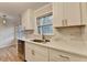 Kitchen featuring white cabinets and stainless steel appliances at 1758 N Springs Dr, Atlanta, GA 30338