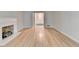 Bright living room with hardwood floors and a fireplace at 1758 N Springs Dr, Atlanta, GA 30338