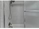 Modern shower with sleek fixtures, light grey tiles and clear glass door at 1758 N Springs Dr, Atlanta, GA 30338