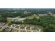 Suburban neighborhood surrounded by lush greenery and convenient access to nearby amenities at 2377 Kesgrove Way, Buford, GA 30518