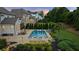 Backyard features a pool, spa, and patio, perfect for outdoor relaxation and entertaining at 2377 Kesgrove Way, Buford, GA 30518