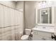 Bathroom featuring a shower with tub and white vanity at 2377 Kesgrove Way, Buford, GA 30518
