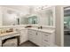 Close-up of a bathroom vanity showing the elegant cabinetry, hardware, and countertop at 2377 Kesgrove Way, Buford, GA 30518