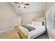 View of the bedroom with shuttered window and comfortable bed at 2377 Kesgrove Way, Buford, GA 30518