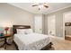 Bedroom with carpet flooring leading to en suite bathroom at 2377 Kesgrove Way, Buford, GA 30518